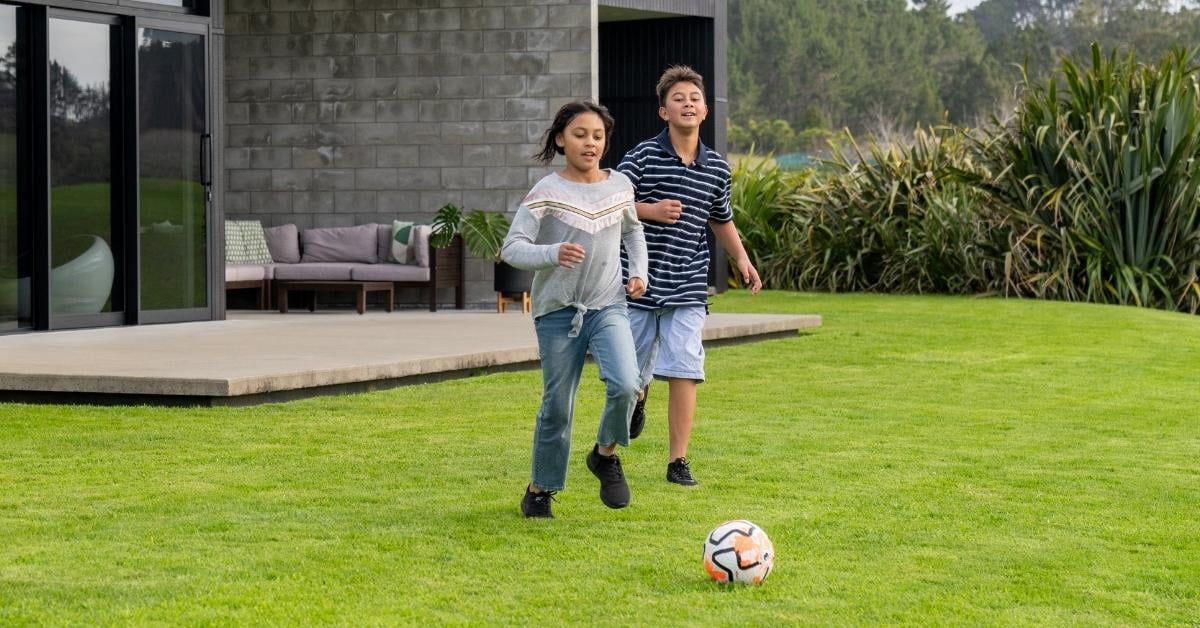 Kids playing on the grass